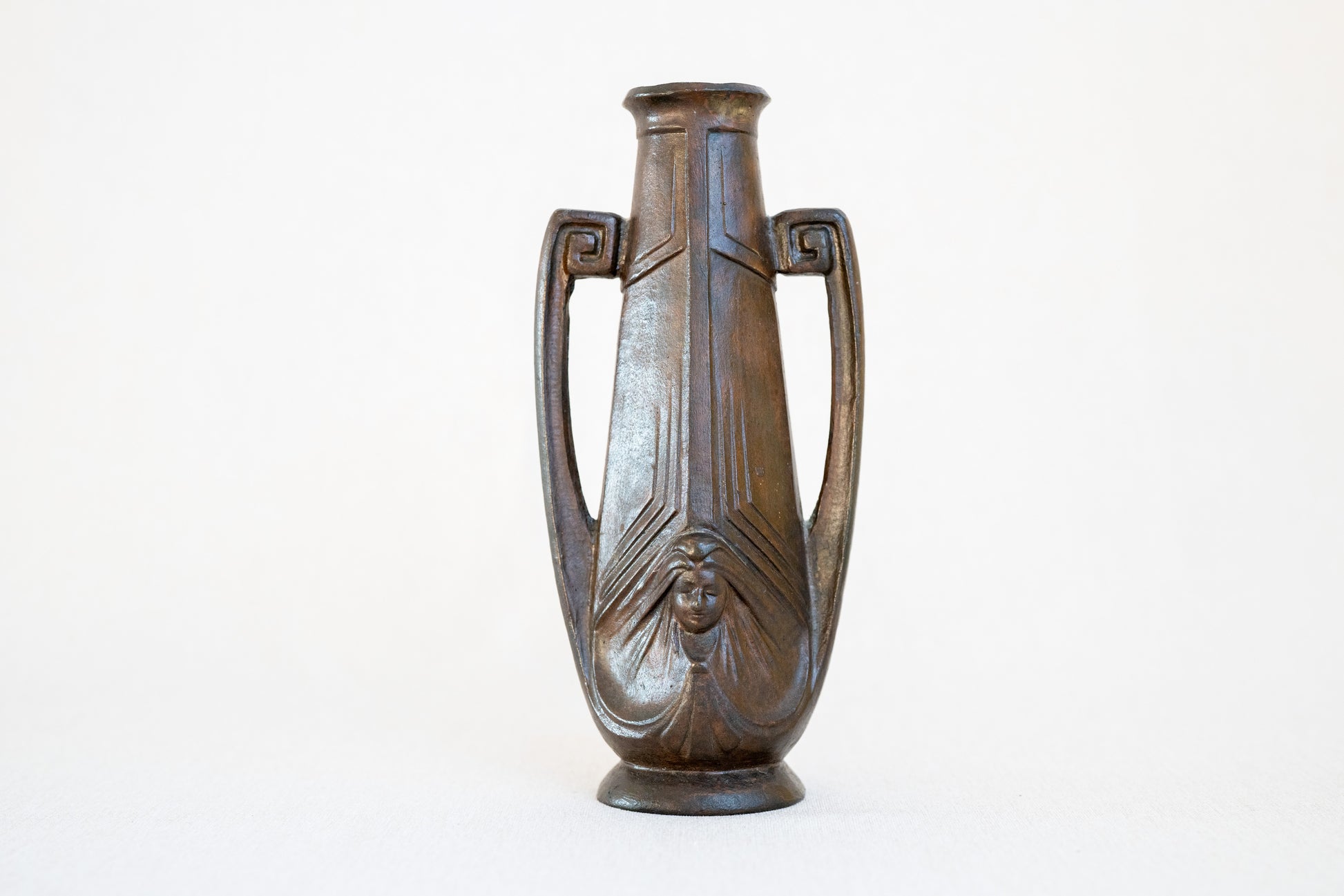 Art Nouveau Cast Iron Vase With Two Faces