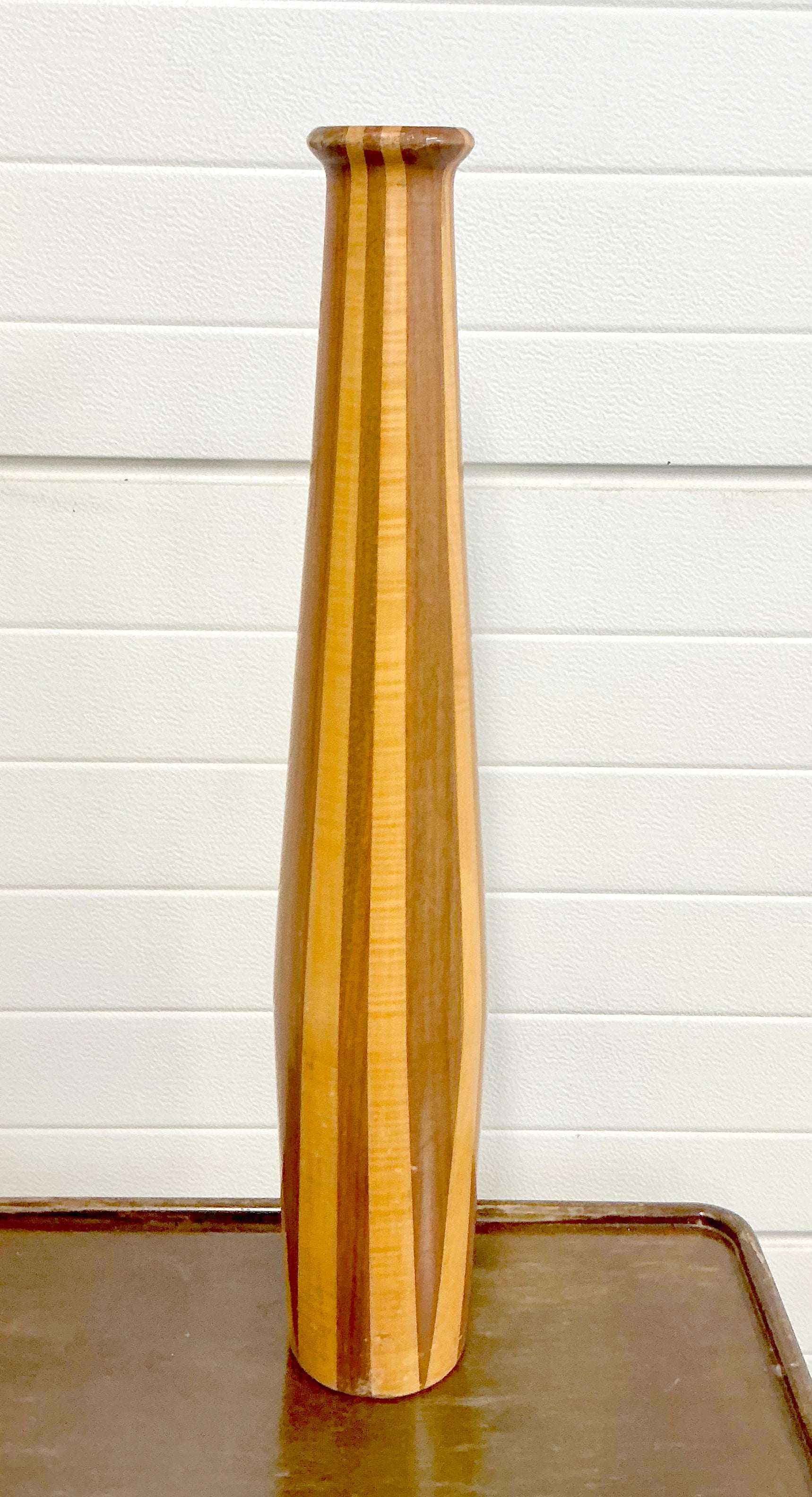 Beautiful view on Tall vintage wood vase stand mid century