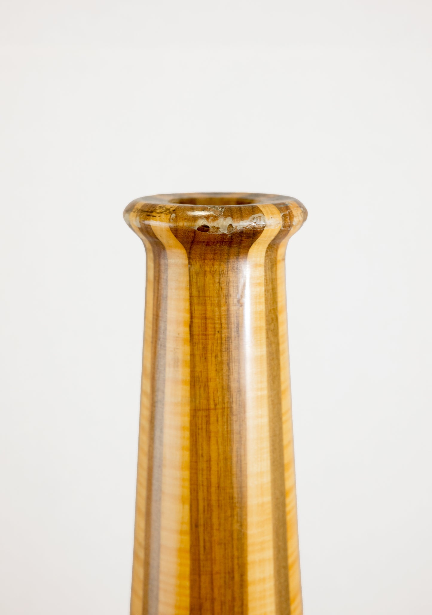 Entry hole damages of Tall vintage wood vase stand mid century
