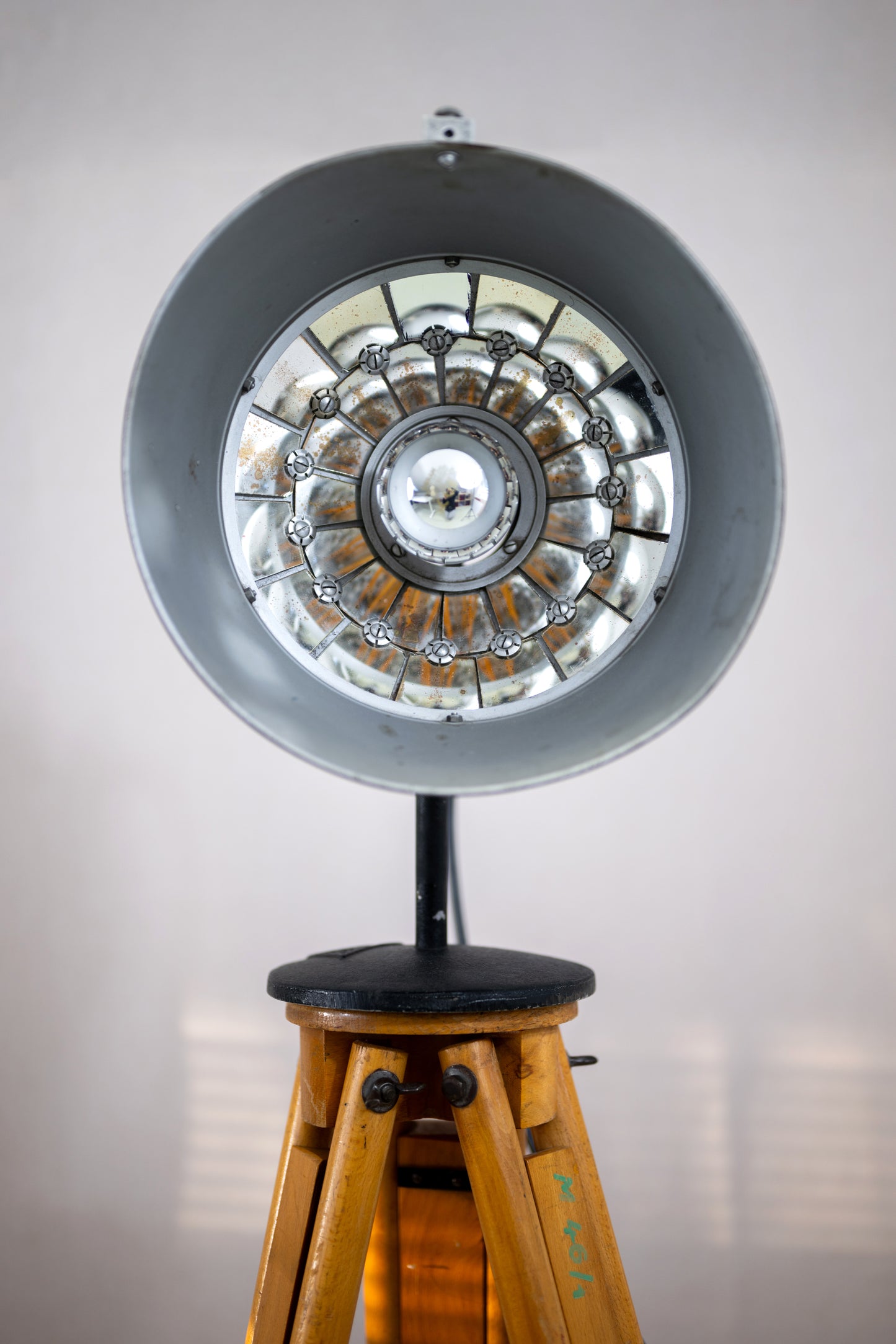Front View of Vintage wooden tripod with lamp Weinert Berlin