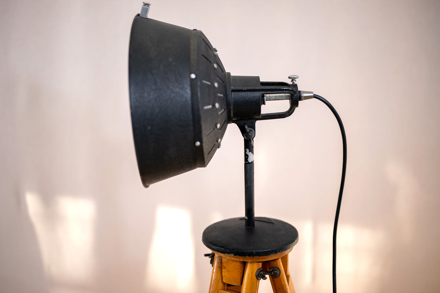 Vintage wooden tripod stand with side view of lamp K. Weinert Berlin